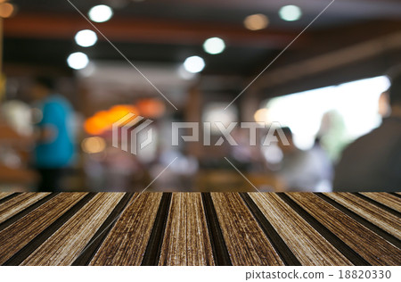 Selected focus empty brown wooden table and Coffee shop blur bac 18820330