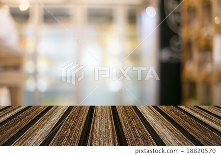 Selected focus empty brown wooden table and Coffee shop blur bac Selected focus empty brown wooden table and Coffee shop blur bac 18820570