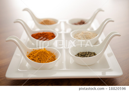 Wooden table of colorful spices 18820596