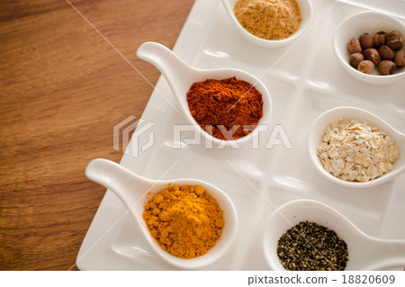 Wooden table of colorful spices 18820609