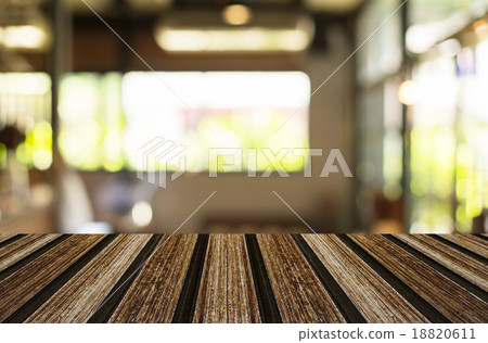 Selected focus empty brown wooden table and Coffee shop blur bac 18820611