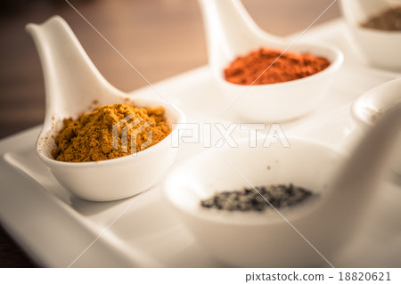 Wooden table of colorful spices 18820621
