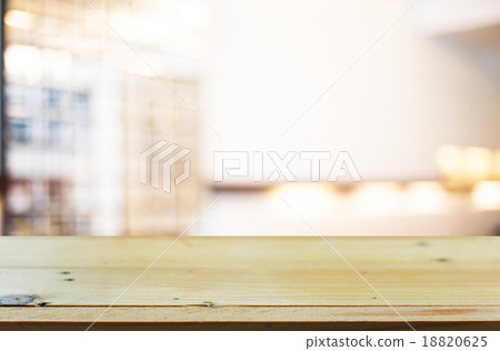 Selected focus empty brown wooden table and Coffee shop blur bac 18820625