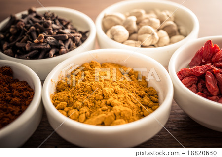Wooden table of colorful spices 18820630