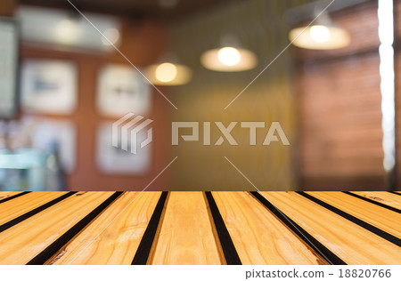 Selected focus empty brown wooden table and Coffee shop blur bac Selected focus empty brown wooden table and Coffee shop blur bac 18820766