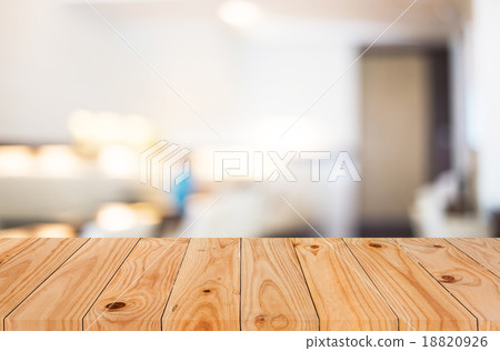 Selected focus empty brown wooden table and Coffee shop blur bac 18820926