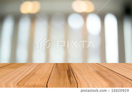 Selected focus empty brown wooden table and Coffee shop blur bac 18820929