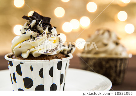 Tasty cupcake on lights background 18821095