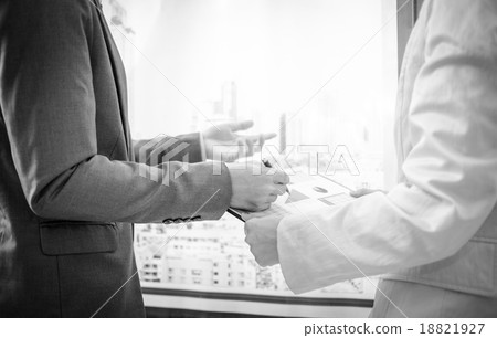 Business people discussing the charts and graphs showing the res Business people discussing the charts and graphs showing the res 18821927