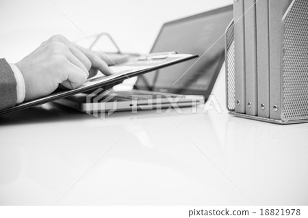Businessman analyzing investment charts with laptop. Accounting Businessman analyzing investment charts with laptop. Accounting 18821978