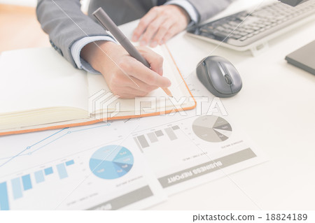Businessman analyzing investment charts with computer. Accountin 18824189