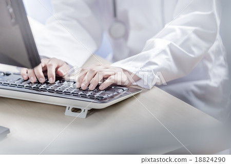 Close-up Of Female Doctor Filling The Medical Form 18824290