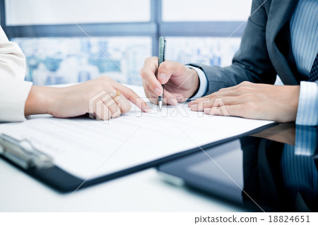 Business man signing a contract Business man signing a contract 18824651