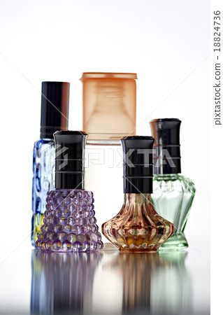 Many Bottle with Perfume different color isolated. Many Bottle with Perfume different color isolated. 18824736