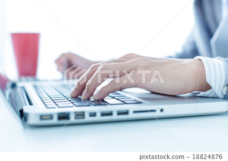 Businessman analyzing investment charts with laptop. Accounting Businessman analyzing investment charts with laptop. Accounting 18824876