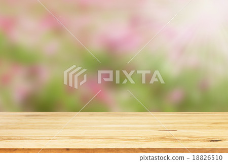 Wood table top on blurred background - can be used for montage o 18826510