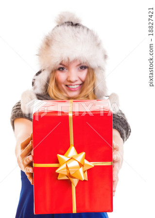 winter girl with red gift box isolated 18827421