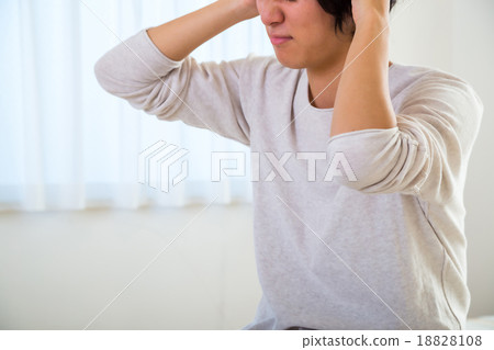 Headache hangover fatigue fatigue tired of sickness poor physical condition of young men in their teens or 20s portrayed Headache hangover fatigue fatigue tired of sickness poor physical condition of young men in their teens or 20s portrayed 18828108