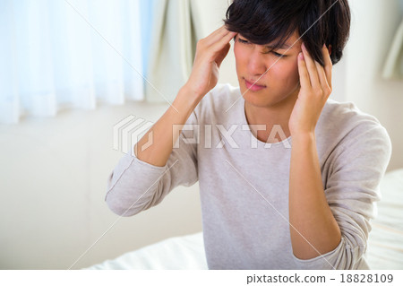 Headache hangover fatigue fatigue tired of sickness poor physical condition of young men in their teens or 20s portrayed 18828109
