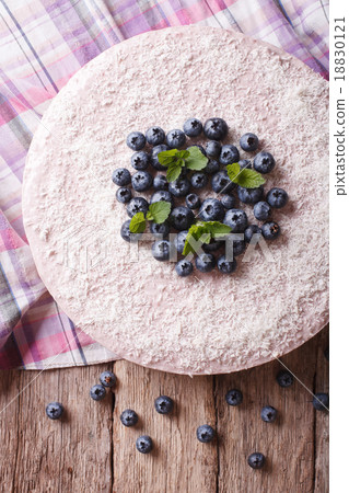 cheesecake with blueberries and mint close-up cheesecake with blueberries and mint close-up 18830121