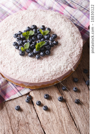 cheesecake with blueberries and mint close-up cheesecake with blueberries and mint close-up 18830122