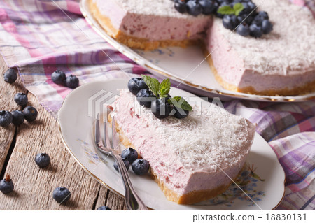 blueberry cheesecake with fresh berries closeup 18830131