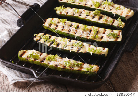 zucchini with cheese on a grill pan close-up zucchini with cheese on a grill pan close-up 18830547