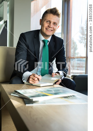 Business man in a stylish suit Business man in a stylish suit 18831088