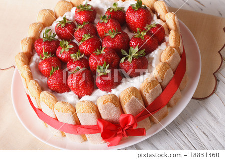 Delicate dessert strawberry cake closeup Delicate dessert strawberry cake closeup 18831360