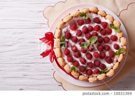 raspberry charlotte cake with Savoiardi top view raspberry charlotte cake with Savoiardi top view 18831369