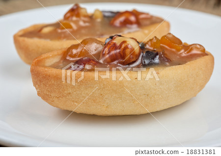 French basket sweet cakes  18831381
