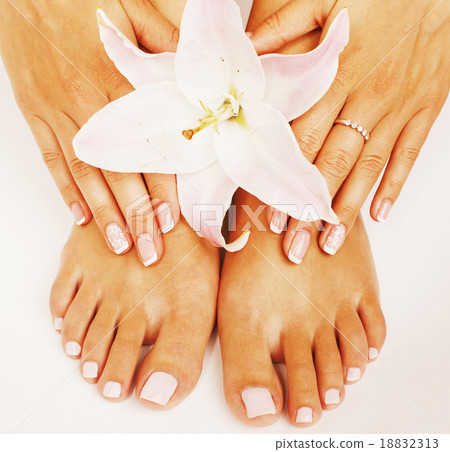 manicure pedicure with flower lily close up 18832313