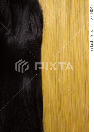 Texture of black and golden blond hair 18834042