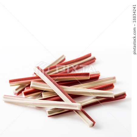 Yummy meat flavor dog treat sticks on background 18834241