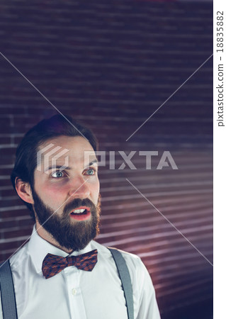 Confused hipster looking away 18835882