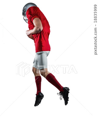 American football player in mid-air 18835999