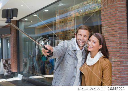 Young happy couple taking a selfie Young happy couple taking a selfie 18836021