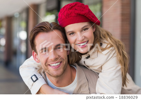 Girlfriend piggy-backing on her boyfriend 18836029