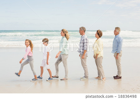 Multi generation family standing beside one another Multi generation family standing beside one another 18836498