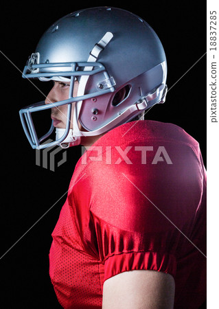 Side view of serious sportsman standing 18837285