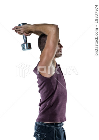 Profile view of athlete working out with dumbbells Profile view of athlete working out with dumbbells 18837974