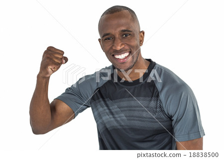 Portrait of sportsman cheering after success in rugby 18838500