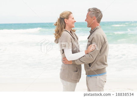 Happy couple holding each other 18838534