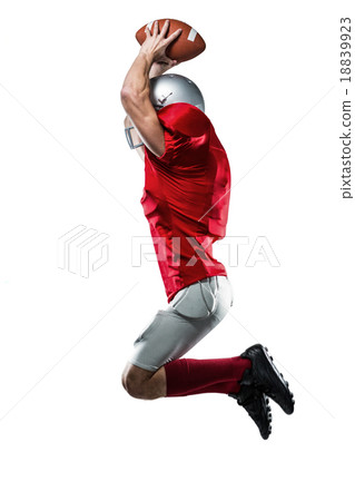 American football player in red jersey jumping 18839923