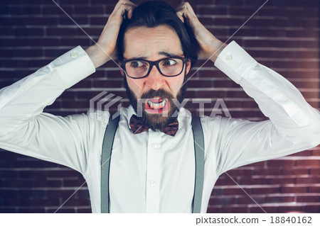 Worried man with head in hands looking away 18840162