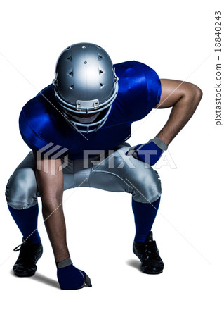 American football player in uniform bending American football player in uniform bending 18840243