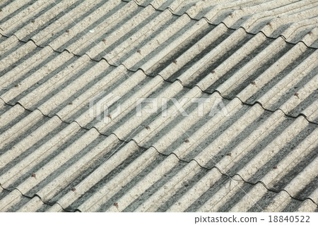 Old grey waved asbestos roof  18840522