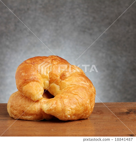 croissant bakery on teakwood table 18841487