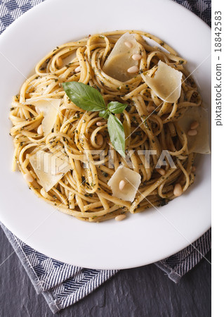 linguine pasta with pesto and parmesan top view linguine pasta with pesto and parmesan top view 18842583