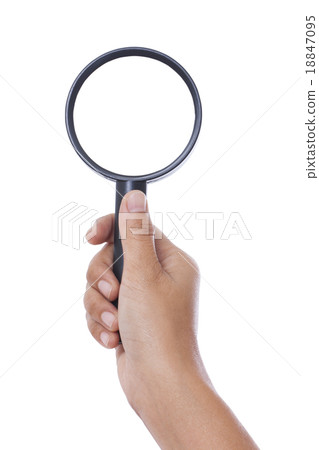 Hand holding magnifying glass isolated on white ba Hand holding magnifying glass isolated on white ba 18847095